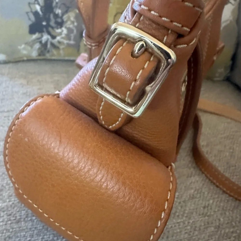 Dooney & Bourke Pebbled Grain Pocket Sac Crossbody with Side Pockets.